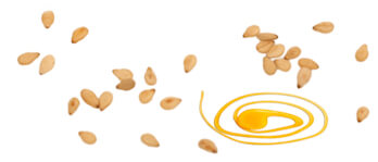 honning på bord med kerner